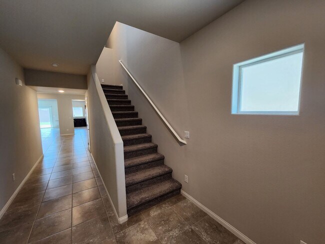 Building Photo - A Fairly New Home with 5 Bedrooms in a gated community