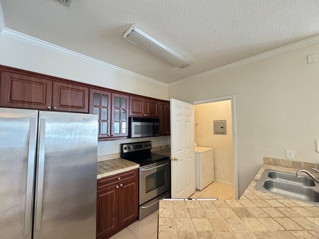 Building Photo - Gated Condo Next to The Mall At Millenia with Great Amenities