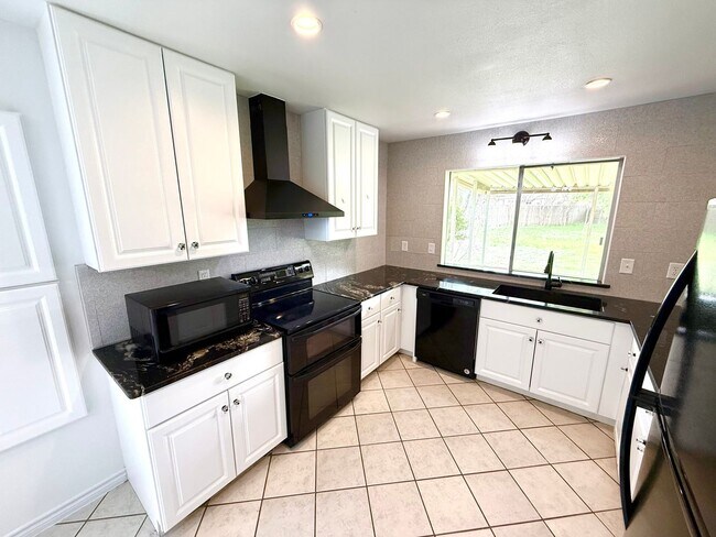 Building Photo - MUST SEE! AVAILABLE NOW! UNIQUE 4 Bedroom/...