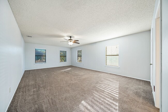 Building Photo - Sign your lease and receive a FREE 50" TV!!!  "Spacious 4-Bedroom Retreat with Fireplace in Charm...