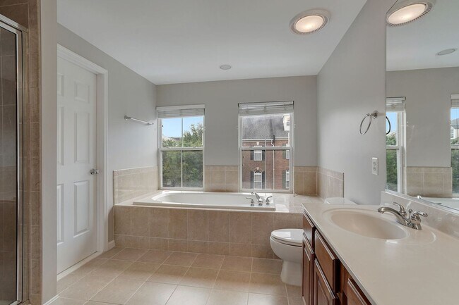 Building Photo - COMING SOON - Great 4 level end unit TH in...