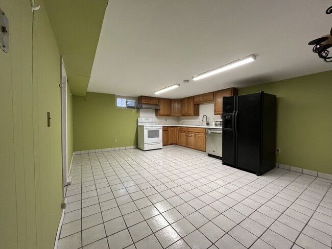 Building Photo - Classic Brick Portland Home on Stark Street with Dual Living Areas and Two Full Kitchens