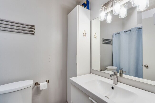 Building Photo - "Spacious 4-Bedroom Gem with 3 Full Baths ...