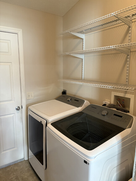 Laundry with new washer/dryer - 1631 Blossom Ter