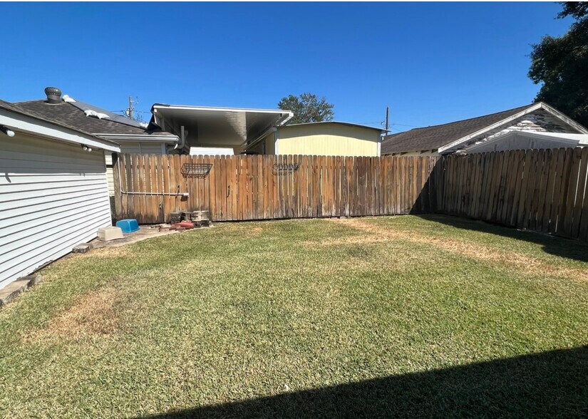 Back yard , lawn care provided - 451 Marion Ave