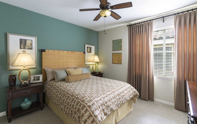 Primary Bedroom with Bay Windows - Golf Brook Apartments