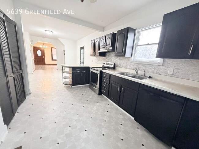 Building Photo - 5639 Greenfield Ave