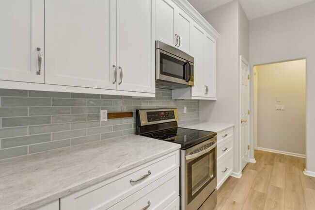 Building Photo - Coastal Luxury Meets Modern Efficiency – 4...
