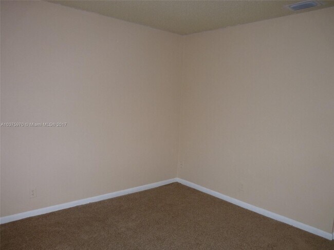 Building Photo - 3100 Coral Springs Dr