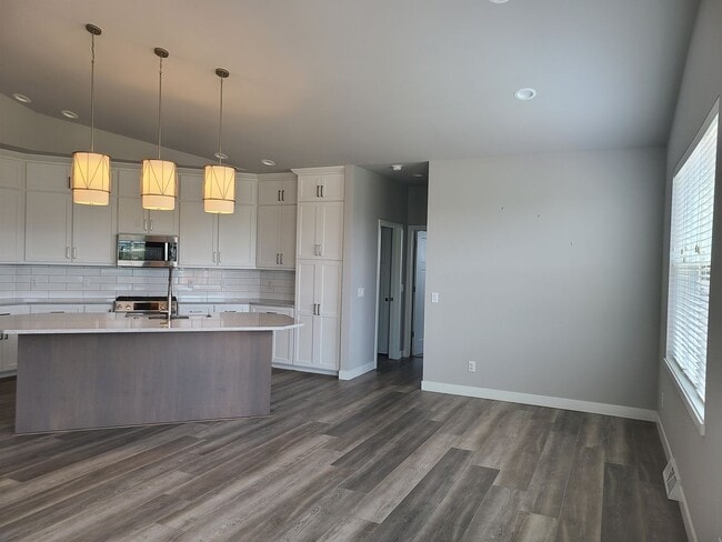 Building Photo - Four Bedroom Three Bath Single Family Home