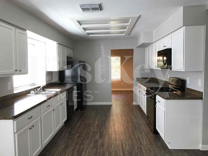 Building Photo - 4706 Whispering Falls Dr