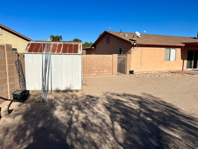 Building Photo - Enjoy the large lot on this 3 Bedroom, 2 B...