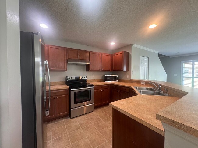 Building Photo - Now Available ! 3BR/2.5BA | Townhome | 1-Car Garage Parking | Community Pool!