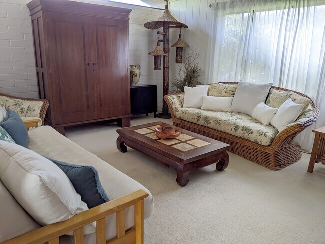 Living room with sofa for lounging - 426 Ilimano St