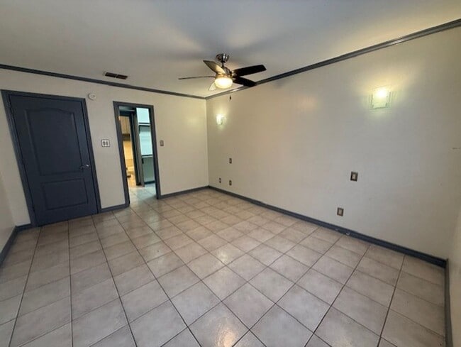 Building Photo - Downstairs -Three-bedroom Condo