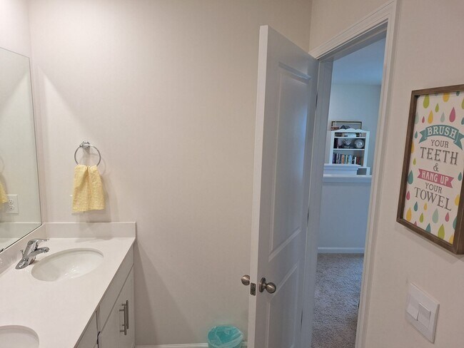 Building Photo - Lovely Four Bedroom Home  Appropriately 5 ...