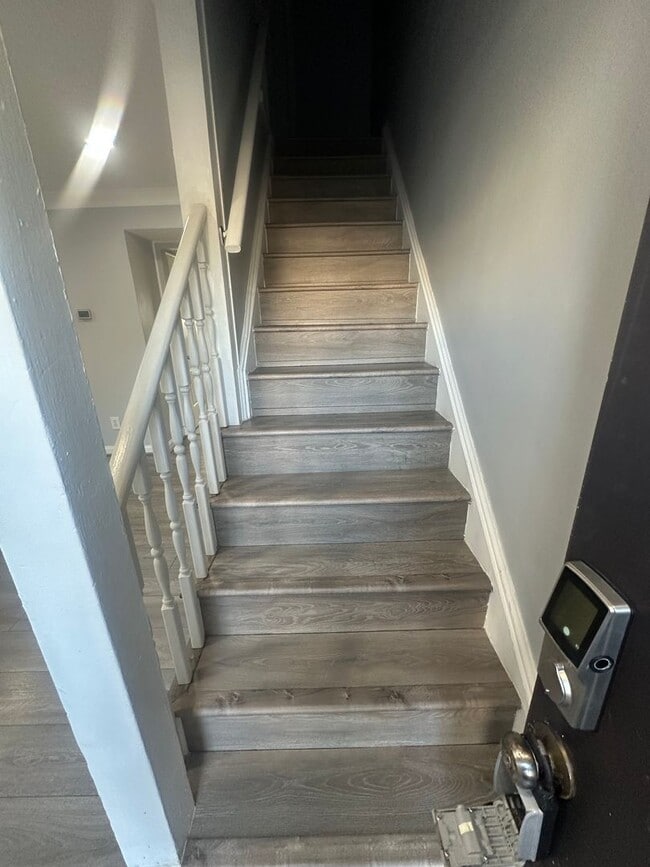 Building Photo - Centrally Located 2 BR Green Townhome with Fenced Patio