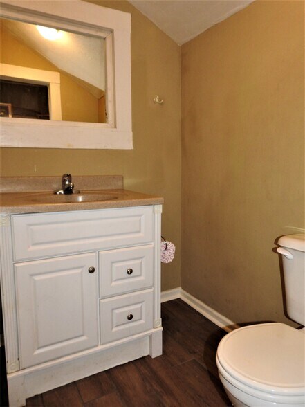 Second full bathroom has vanity, toilet and walk-in shower - 3230 PARK AVE