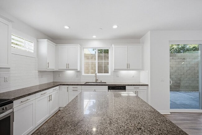 Building Photo - NEW LISTING 4 Bedroom, 3 Bathroom, 2 Garage Detached Condominium, with HVAC, Tankless Water Heate...