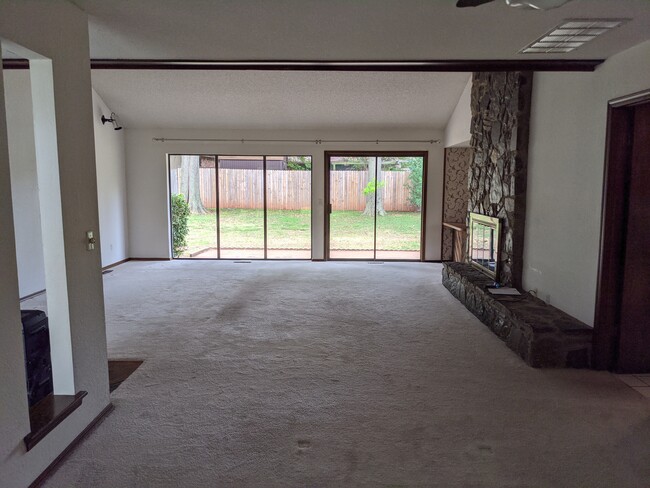 Dining area looking into living room - 205 N Easy St