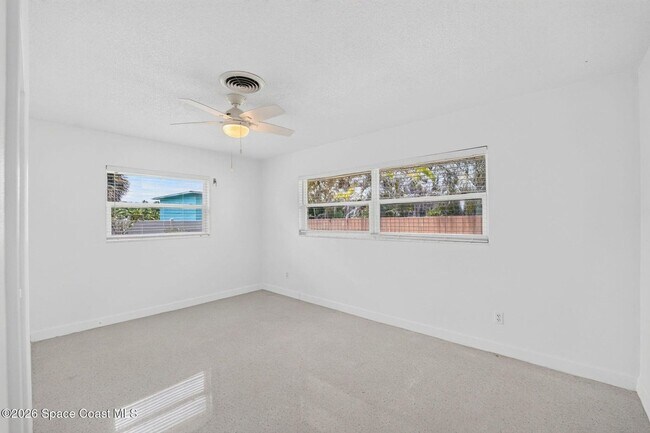 Building Photo - Welcome to this beautifully remodeled 4-bedroom, 3-bath home in the heart of Indialantic Beach!