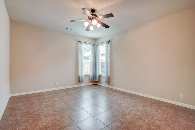 Building Photo - Bright & Roomy 4BR • 2.5BA • Two-Level Living