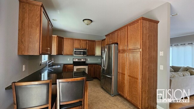 Building Photo - FREE July Rent for this Quiet, Four Bedroo...