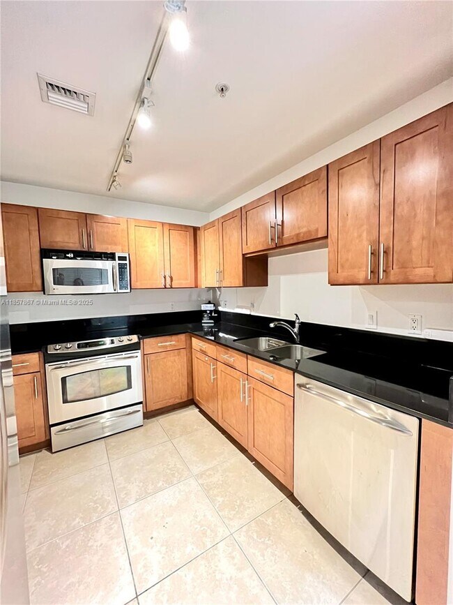 Building Photo - 8390 SW 72nd Ave