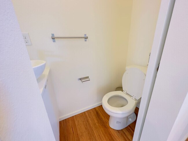 Building Photo - 3 Bedroom Central District Townhome w/ Garage, AC & Rooftop Deck