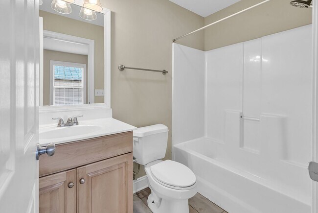 Building Photo - No "BAH HUMBUG" fees here! Rents always include high speed internet, cable, water, sewer, trash &...