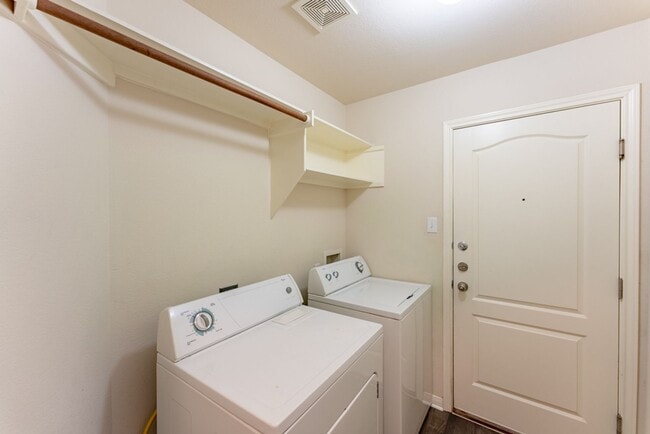 Building Photo - Charming Brick Home with Open Floorplan, Vaulted Ceilings, and Luxurious Amenities—Perfect for An...