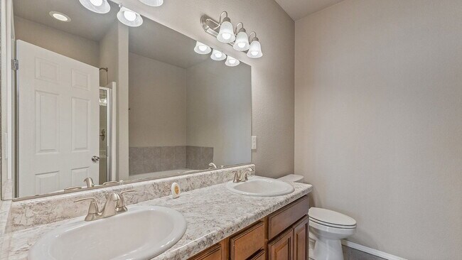 Building Photo - Spacious 4-Bedroom with Elegant Granite Finishes