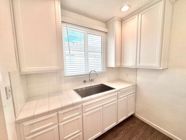 Building Photo - An apartment with character! Hardwood floo...