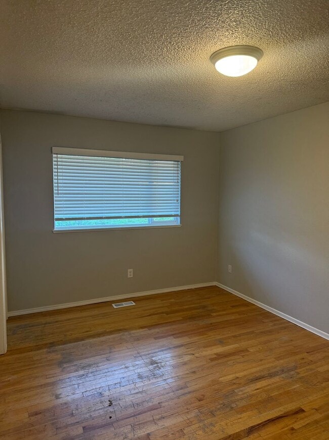 Building Photo - COMING SOON--Beautiful 3 Bedroom with a Living Room, Family Room, Fenced Yard & More!