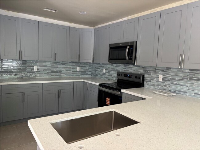 Building Photo - 5450 NW 94th Terrace