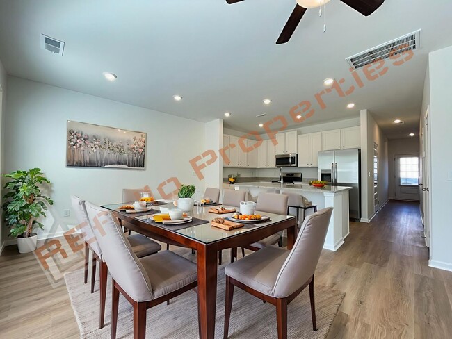 Building Photo - Move In by April 30 & Save $200/Month! Townhome Only $1,695! Regular $1,950 — Available NOW