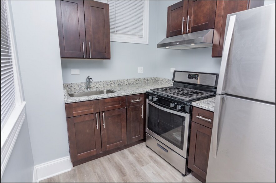 Building Photo - 7754 S Muskegon Ave