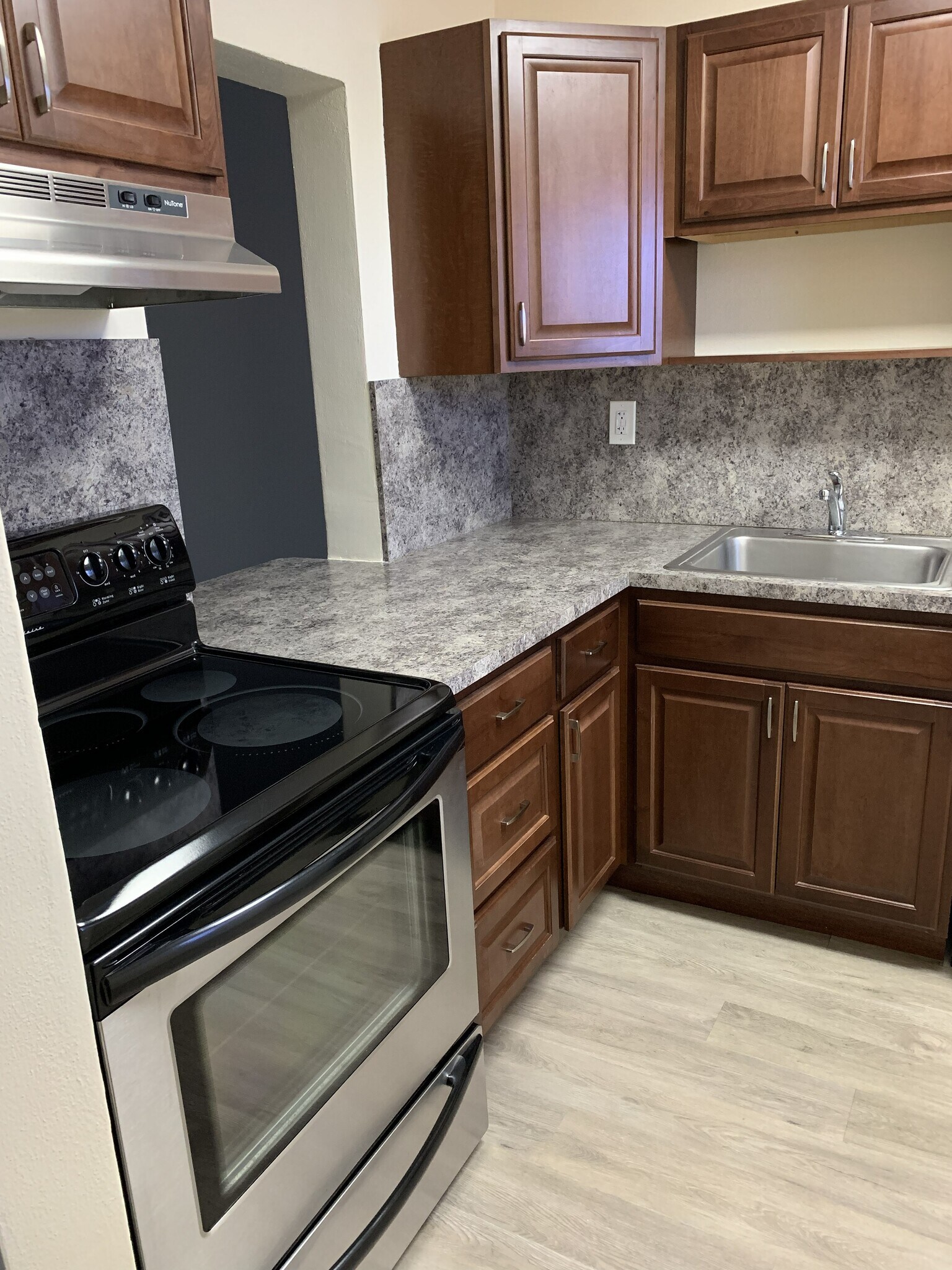 Renovated Kitchen with Stainless Steel Stove - 1400 NE 57th St