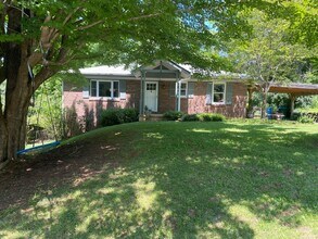 Building Photo - North AVL - Spacious Home with Large Yard and Outdoor Fireplace!