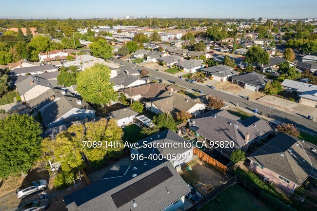 Building Photo - 7089 14th Ave