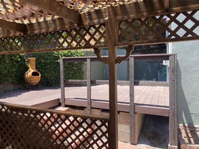 Gazebo and deck outside bedroom area. - 6206 Temple Hill Dr
