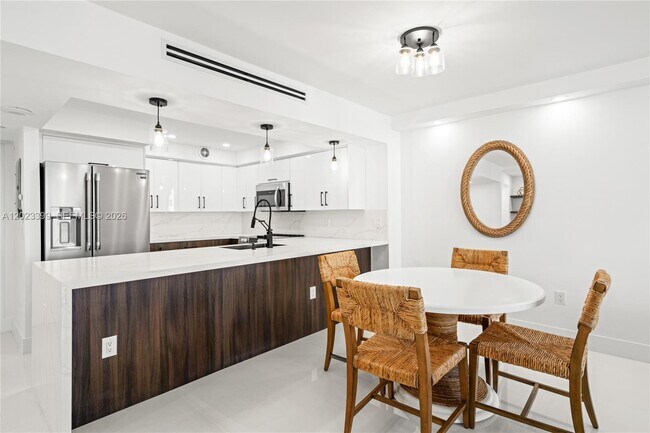 Building Photo - 5701 Collins Ave