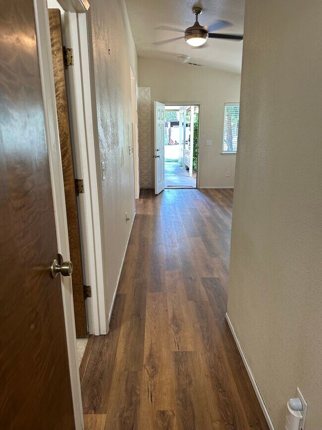 Building Photo - Charming Redding Home with Fireplace & Vau...