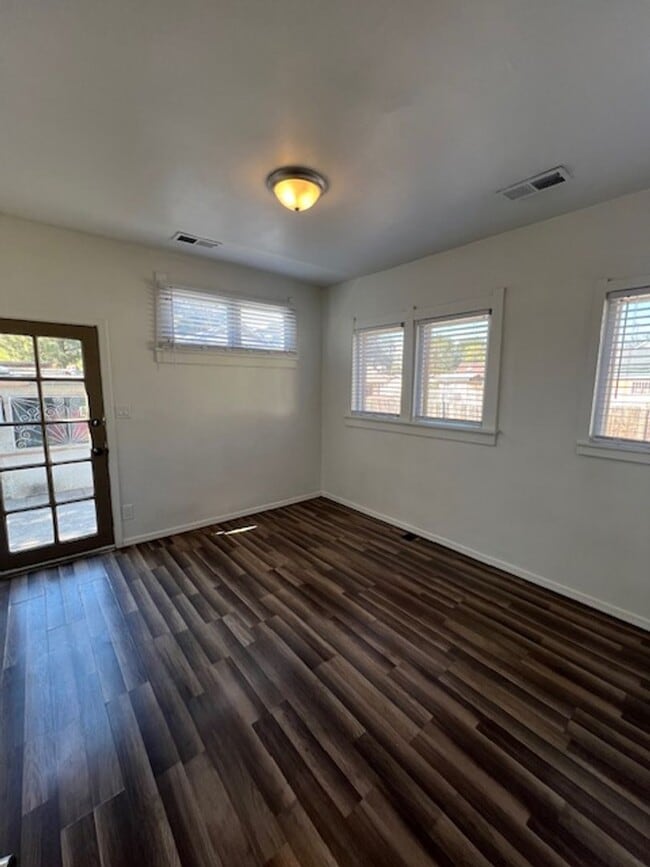 Building Photo - Can’t get any closer to Downtown Albuquerque, two bedroom one bath duplex
