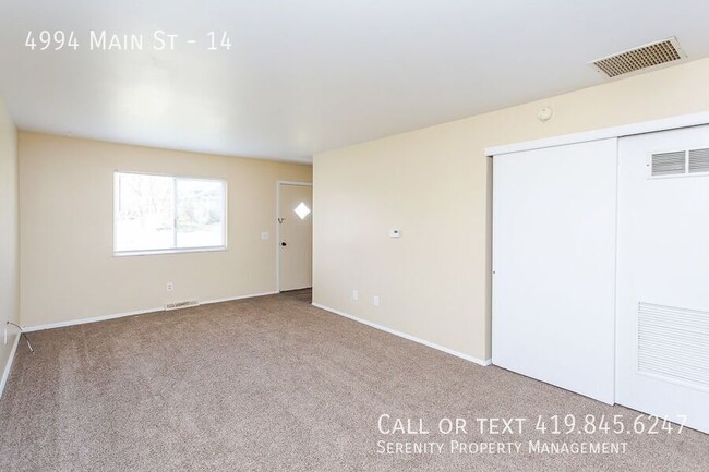 Building Photo - Fall In Love With This Two bedroom Townhom...