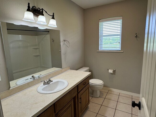 Building Photo - Available July 2025! 4-Bedroom, 2-Bathroom...