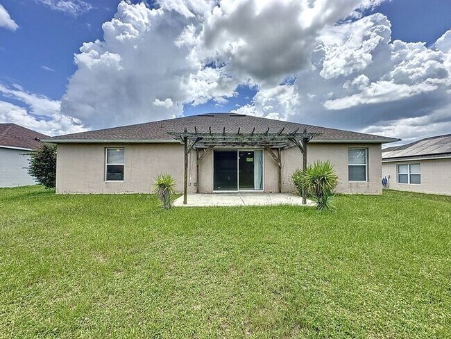 Building Photo - Poinciana single family home in Village 7,...
