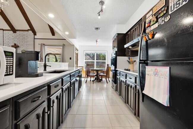 Building Photo - Discover Old World Charm in Northern Hills!