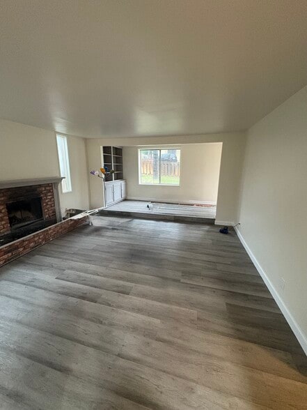 Living room area looking toward front of house. - 23162 Smith Rd