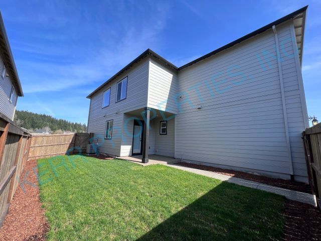 Building Photo - FREE RENT! Spacious 4-Bedroom Home in Happ...